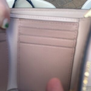 Michael Kors pink and beige purse and wallet